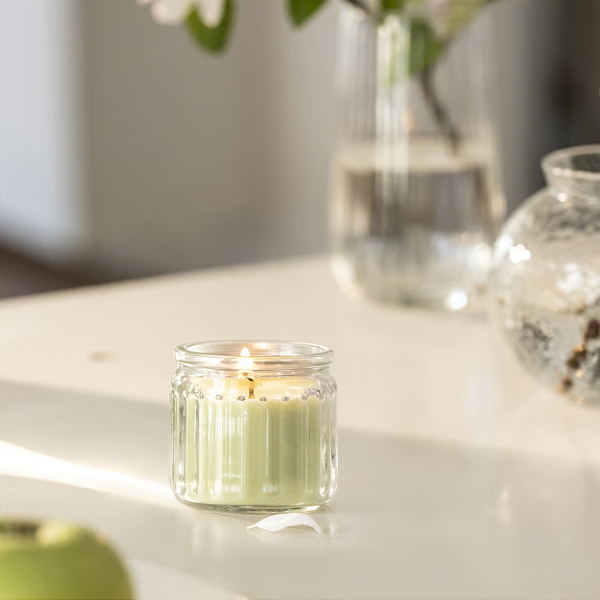 LOVSKOGSLUND Mirisna svijeća u čaši, jabuka/svijetlozelena, 12 h